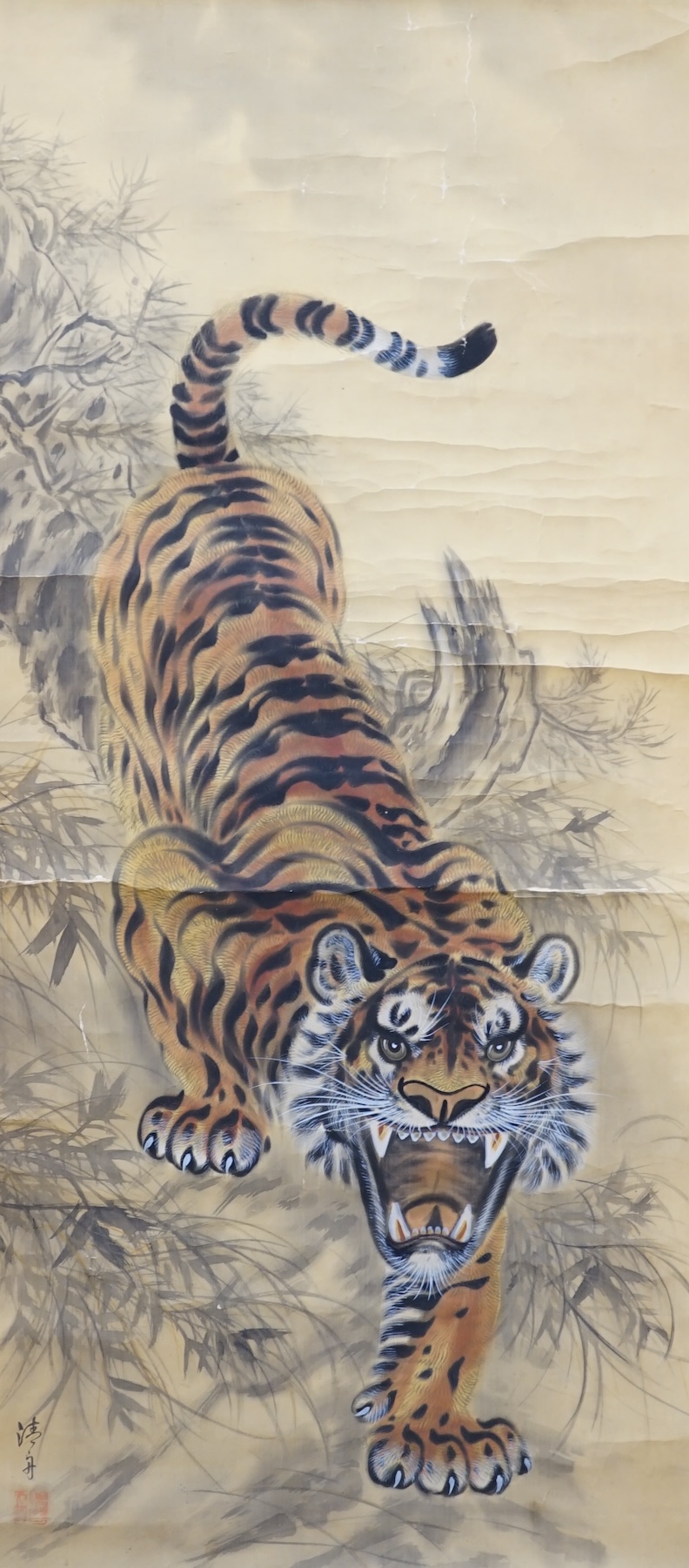 A Japanese ‘tiger’ scroll painting. Condition - fair